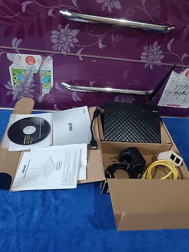 Модемы и сетевое оборудование: Маршрутизатор ASUS RT-N10U Wireless N150 Особенности: - Беспроводной — 9