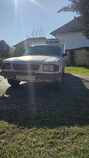 QAZ: QAZ 3110: 2.4 l | 1998 il Sedan — 4