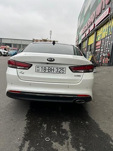 k5 kia: Kia K5 sedan – ağ rəng, benzinli, avtomat ötürücü. Xarici: - Arxa — 1