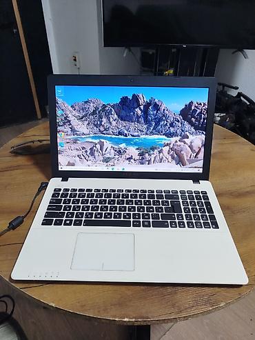 notebook: Ноутбук ASUS белого цвета, оснащенный процессором AMD A4-5000 APU со — 1