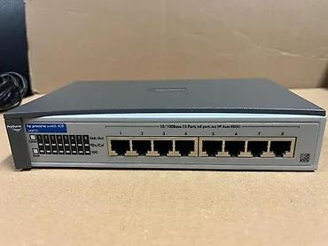 Modemi, ruteri i mrežni uređaji: HP ProCurve Switch 408 (model J4097C) - Mrežni preklopnik sa 8 Fast — 4