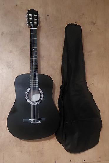 gibson gitara: Qara rəngli klassik akustik gitara seti Məlumatlar aşağıda qeyd — 2