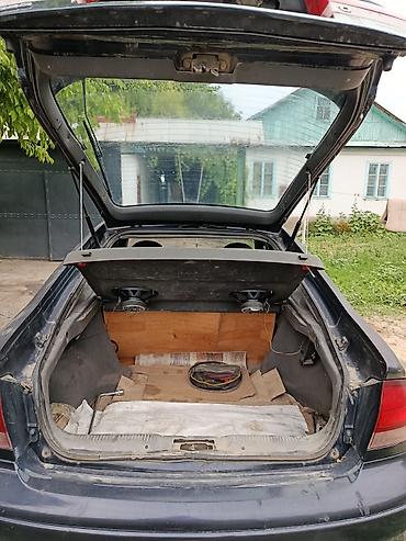 обвес 6 3: Mazda 626: 1994 г., 1.8 л, Механика, Бензин, Лифтбек — 9