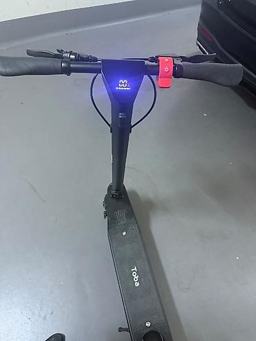 elektrikli scooter toba: Elektrikli skuter – Toba - Rəng: qara, yığcam və minimal dizayn - — 2