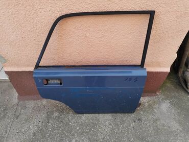 Auto delovi: Vrata zadnja desna Lada 2107 Riva,2105 u plavoj boji ZD1. Vrata su — 2