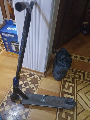 idman elcekleri: Freestyle/skuter (pro scooter) - Güclü metal gövdə və T-formalı sükan