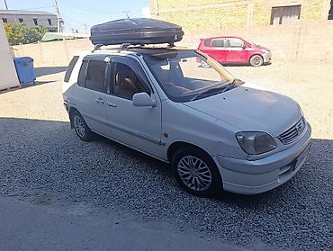 китайский танк: Toyota Raum: 2003 г., 1.5 л, Автомат, Бензин — 2