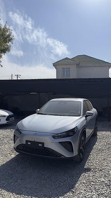 Tesla: NETA L последовательный гибрид современныйкроссовер серебристый) - lalafo.kg да — 3 Tesla: NETA L последовательный гибрид современныйкроссовер серебристый) - — 3