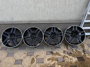 Диски: Комплект из 4 легкосплавных дисков AMG. - Диаметр: 20" (визуально — 4
