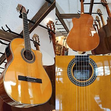 Gitaralar: Elektro klassik gitara Smiger EC320-39E Simlərin sayı: 6 Çanta və — 1