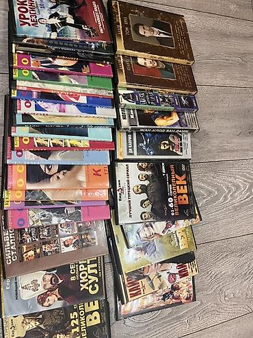 CD, DVD дисктер: Коллекция видеокассет VHS и DVD с фильмами и сериалами. Состав (по — 1