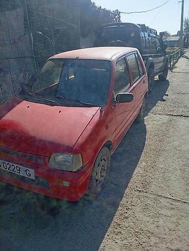 12 220: Daihatsu Cuore: 1991 г., 0.8 л — 1