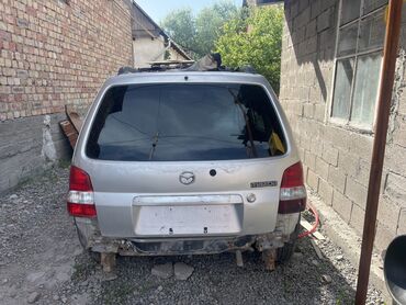 электирик машина: Mazda Demio: 2002 г., 1.5 л, Механика, Бензин, Седан