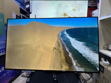 Телевизоры: Телевизор TCL 50V6B, LED, черный Описание Используйте голос для — 23