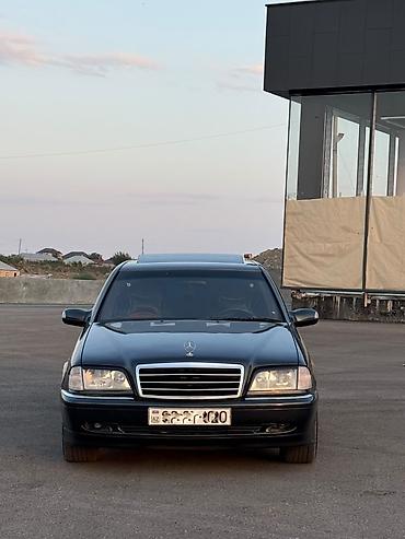 cls 63 amg: Mercedes-Benz C-Class: 2.4 l | 1998 il Sedan — 4