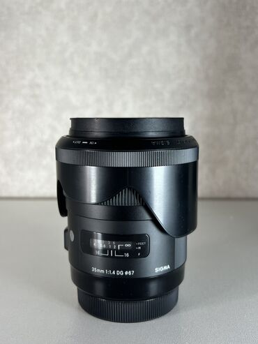 sony 1: Sigma 35mm 1.4DG Art Lens Obyektiv Hec bir problemi yoxdu tam