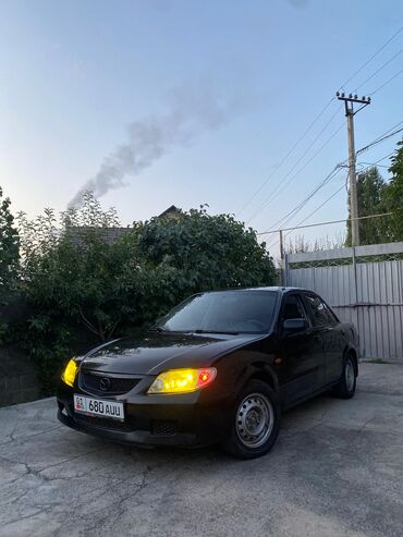 кондиционер не рабочий: Mazda 323: 2001 г., 1.6 л, Автоматтык, Бензин, Седан