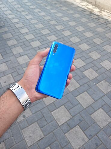 телефон флай кнопочный езжу 9: Xiaomi Mi 9 Lite, 64 ГБ, цвет - Фиолетовый, 
 Кнопочный, Отпечаток пальца, Face ID