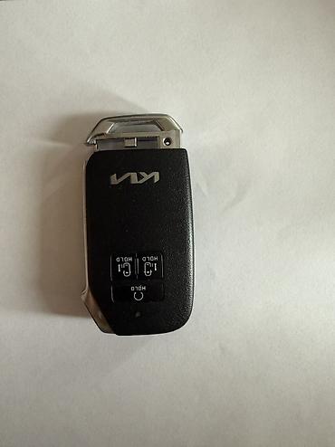 корпус ключа: Продаю ключ для KIA Carnival 3г с кожанным чехлом 
цена 12000 сом — 4