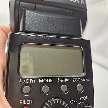 Освещение: Вспышка Canon Speedlite 580EX II - Совместимость: зеркальные и — 14