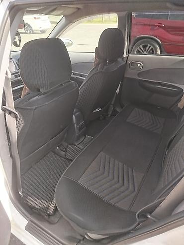 bid машина: Nissan Wingroad: 2004 г., Автомат, Бензин, Универсал — 10