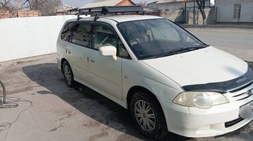 авто запчас бишкек: Срочно!Продам белый минивэн Honda Odyssey с багажником на крыше. Этот