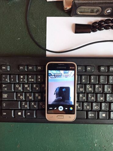 Samsung: Samsung Galaxy J1 Mini, 8 GB, rəng - Qızılı, İki sim kartlı — 16