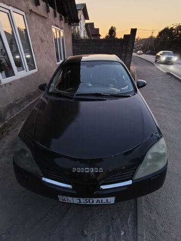 приматок прямоток: Черный седан Nissan Primera с обтекаемым кузовом и тонированными
