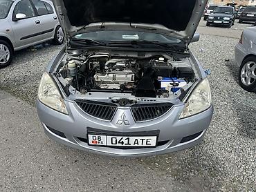 Mitsubishi: Mitsubishi Lancer: 2003 г., 1.6 л, Механика, Бензин, Универсал — 10