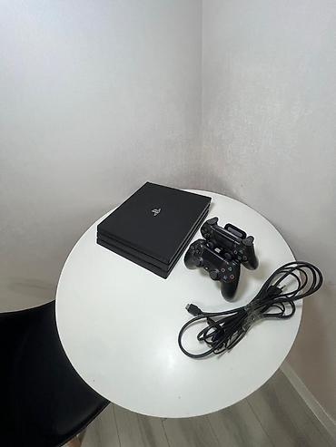 PS4 (Sony PlayStation 4): PlayStation 4 Pro (черный) Комплектация: - игровая консоль PS4 Pro — 3