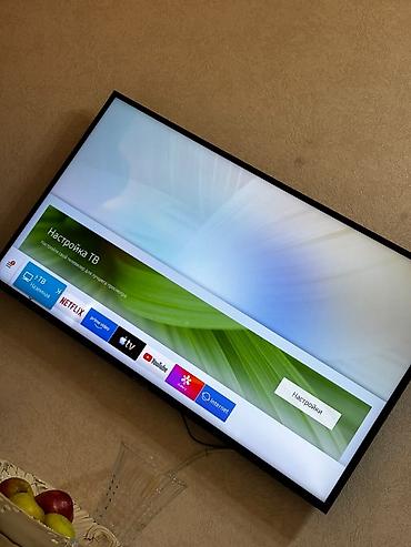 pastavka televizora: Smart TV – divara quraşdırılmış, nazik çərçivəli geniş ekran — 1