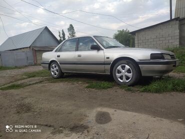 колонка для авто: Mazda 626: 1989 г., 2 л, Механика, Бензин, Седан