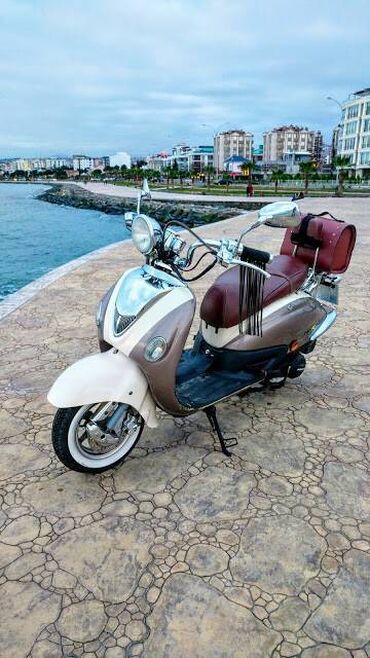 Motonəqliyyat: Moped,Motocikl *Mondial-znu 125 (made in turkiye) *motor: 0.125 cc(125