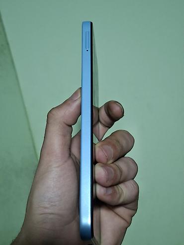 Redmi: Məhsul: Redmi smartfon - Rəng: Açıq mavi - Korpus: Düz (flat) kənarlı — 5