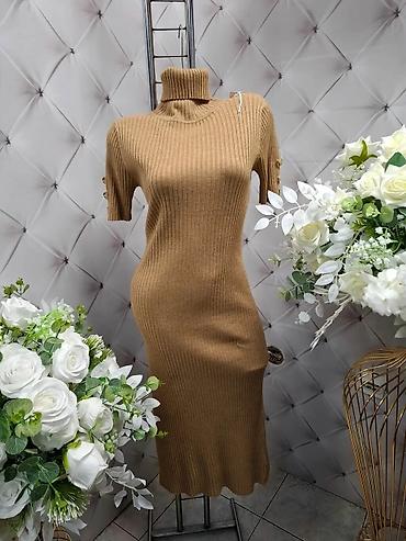 Haljine: Rebrasta pletena haljina sa poludolčevitom - Kroj: uska, midi dužina — 9