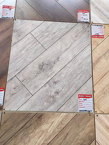 Laminat döşəmə panelləri – taxta teksturalı dekorlar - İstehsalçı