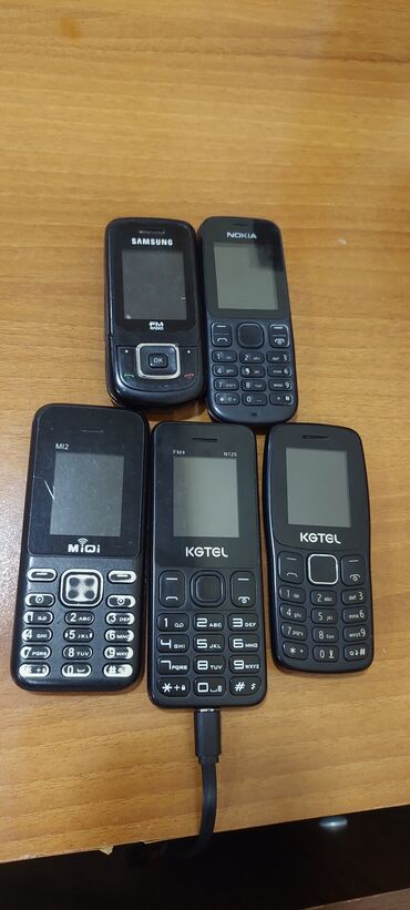 zerbeye davamli telefonlar: Alcatel OT-213, rəng - Qara, Düyməli
