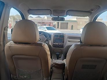 cherry masin: Kia Sportage – qara rəngli, şəhər və yolsuzluq üçün əlverişli kompakt — 4