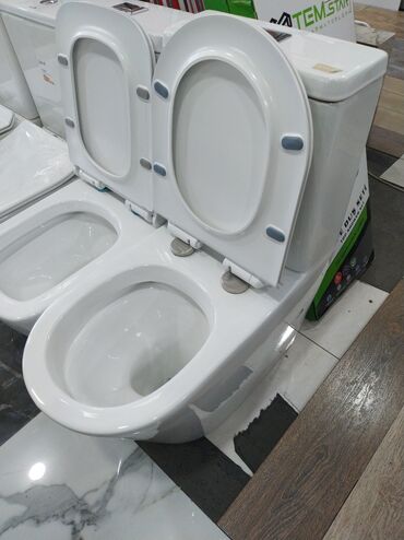 bacok unitaz: Ağ rəngdə olan, müasir dizaynlı unitaz. Yüksək keyfiyyətli materialdan