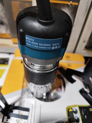 ножи на фрезу: Компактный ручной кромочный фрезер Makita BG373 - Мощность: 580 Вт - — 4