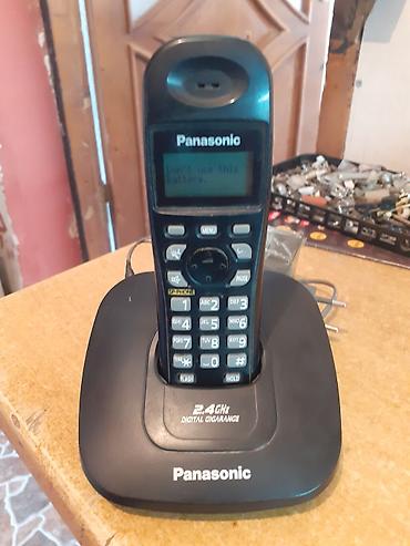 Stasionar telefonlar: Panasonic simsiz ev telefonu və baza stansiyası - Model: 2.4 GHz — 1