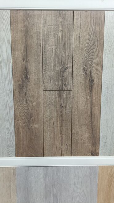 Laminat: Məhsul: Laminat döşəmə örtükləri və aksesuarları Təsvir: - Mağazada — 7