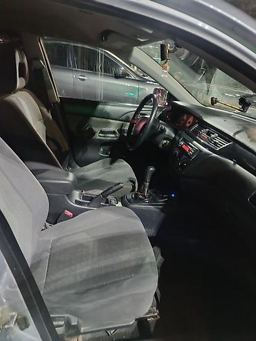 руль мицубиси: Mitsubishi Lancer: 2005 г., 1.6 л, Механика, Бензин, Универсал — 8