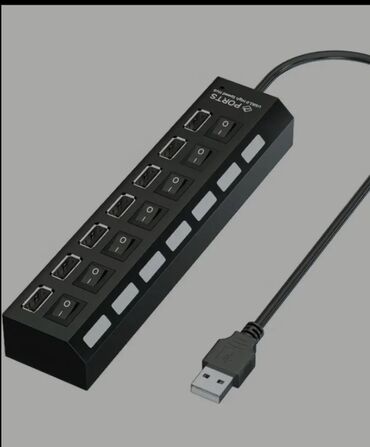 Dok-stansiya: Qara rəngdə, 7 portlu USB paylaşdırıcısı. Hər bir port üçün ayrıca