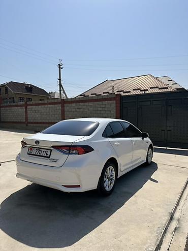 kia 2010: Toyota Corolla: 2022 г., 1.8 л, Автомат, Гибрид, Седан — 4