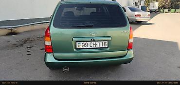 Opel: Opel Astra karvan (universal) – yaşıl rəng - Kuzov: universal, dam — 2