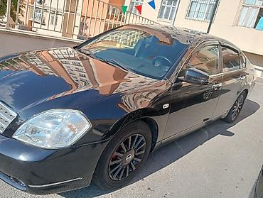 Транспорт: Nissan Teana – qara rəngli, geniş və komfortlu sedan. Xüsusiyyətlər — 3