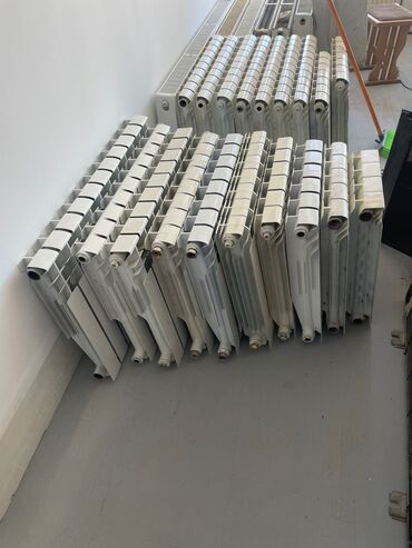 ev qizdiricilar: Seksiyalı Radiator