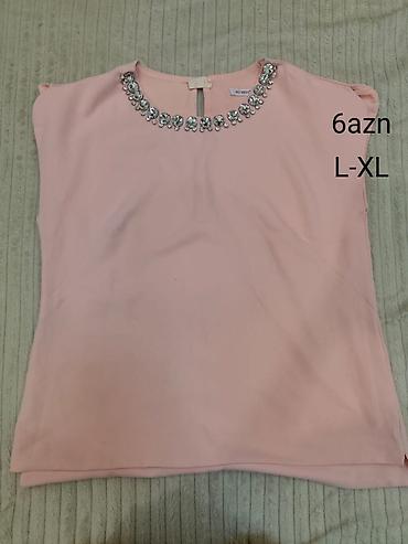 devit 3: L-XL ölçüdə qadın geyimləri i təqdim olunur. Hər biri fərqli üslubda — 4
