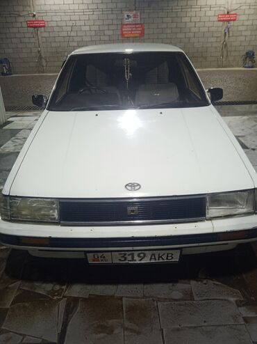 японский машины: Toyota Corolla: 1984 г., 1.5 л, Автомат, Бензин, Седан